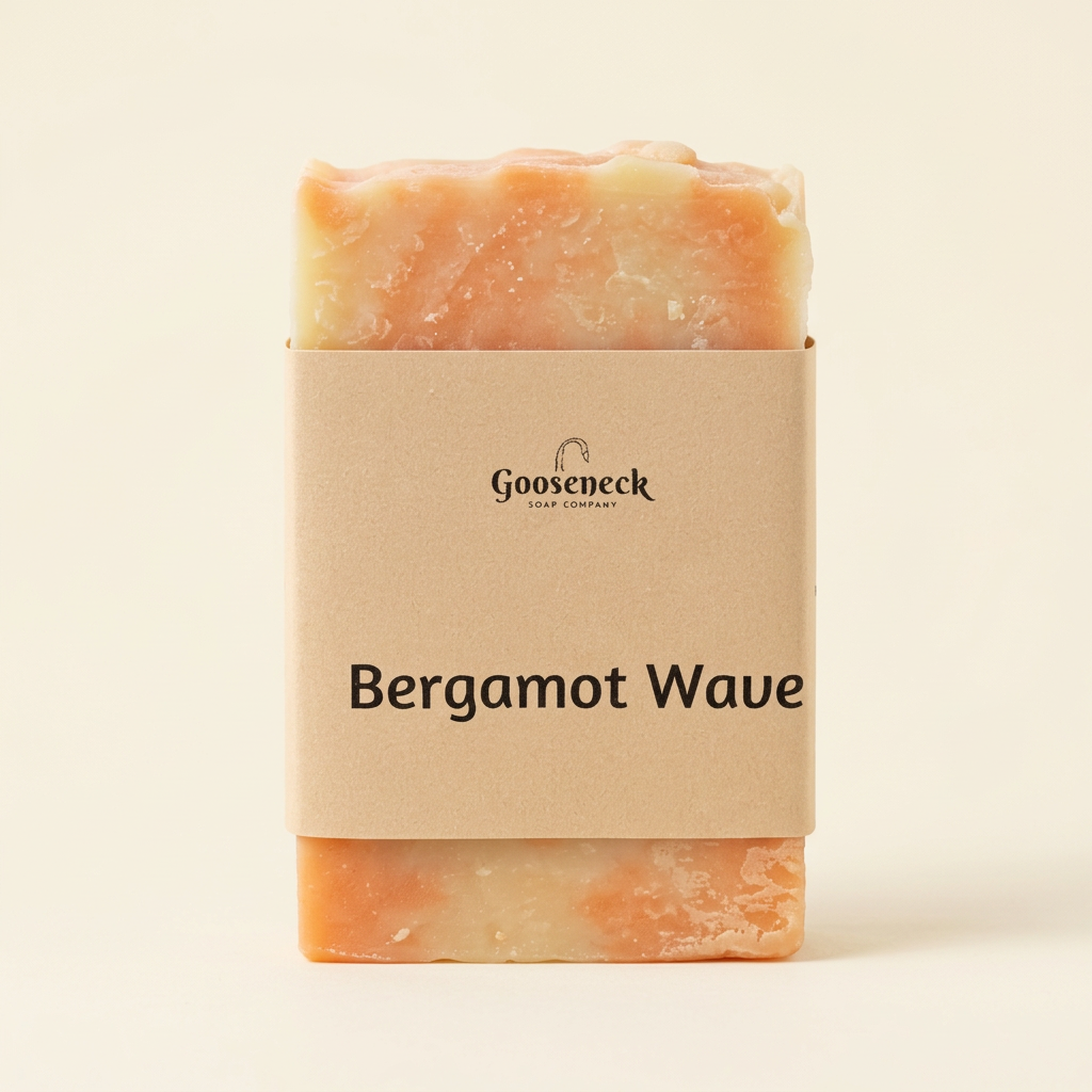 Bergamot Wave soap with its paper label on a warm ivory background
